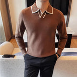 Men's winter sweater in brown with a lapel collar and white trim, knitted for warmth and comfort, ideal for cold weather and casual wear.